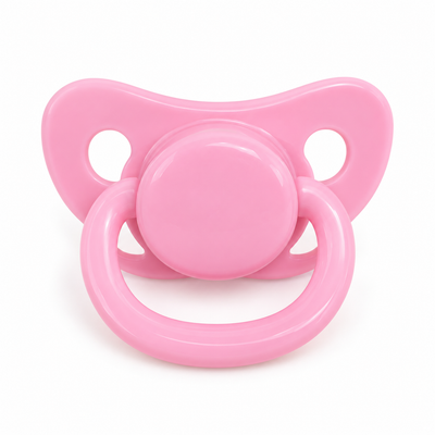 A single pink pacifier photographed on a clean white background.