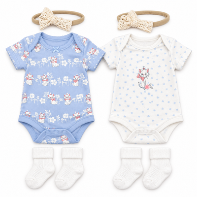 Two baby bodysuits with matching accessories laid out on a white background. The left bodysuit is light blue with a floral print and small cat motifs, paired with a beige bow headband and white socks.